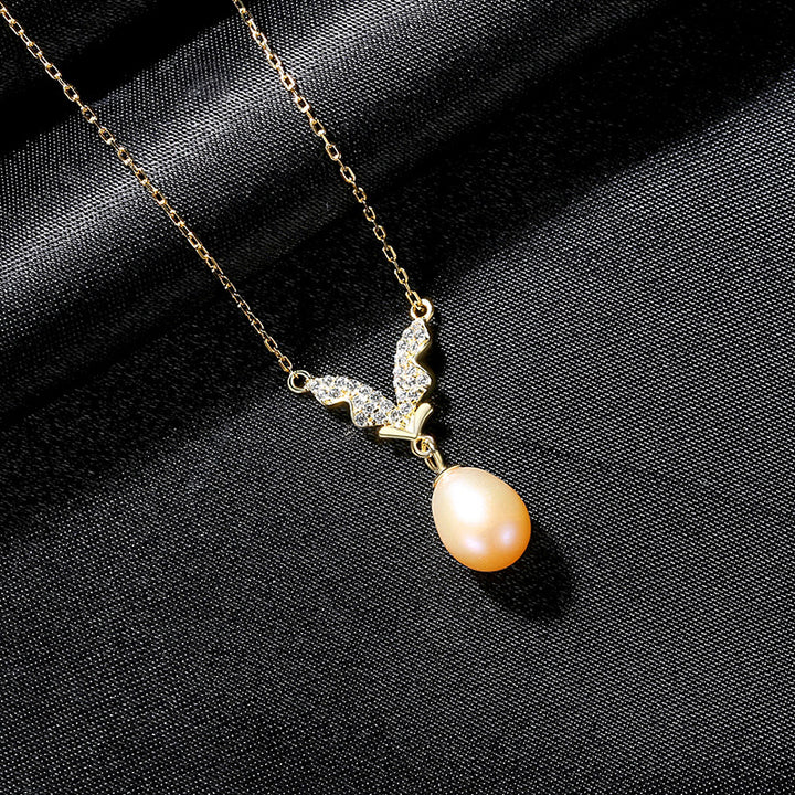  Freshwater Pearl Necklace with Dazzling CZ Wings Pendant 