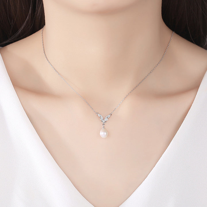  Freshwater Pearl Necklace with Dazzling CZ Wings Pendant 